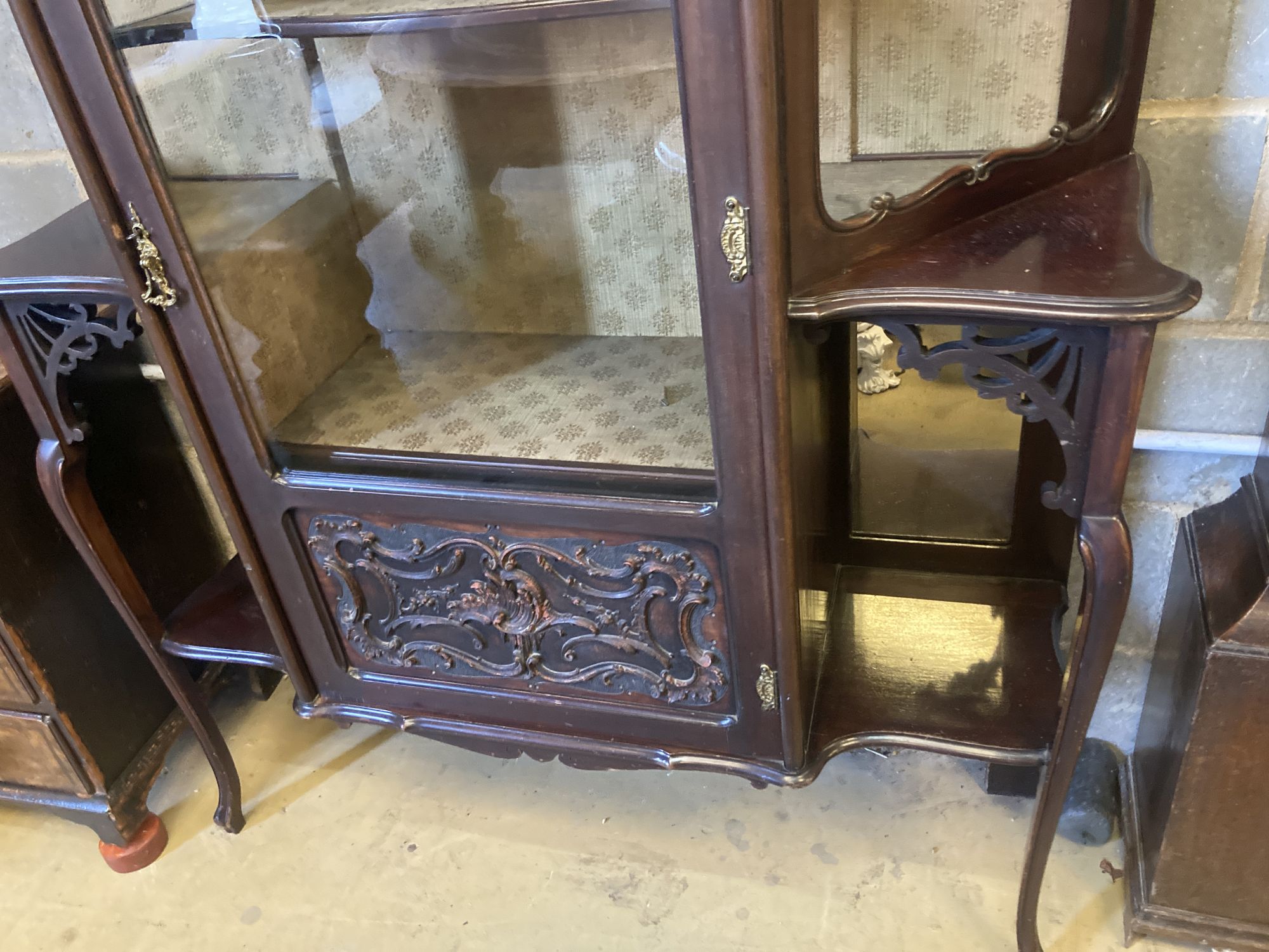 A late Victorian mahogany glass display cabinet, width 127cm, depth 40cm, height 212cm